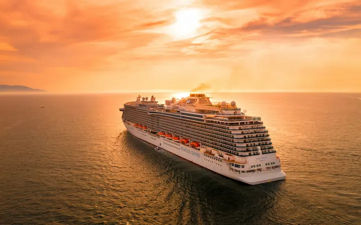 Cruise ship at sea at sunset